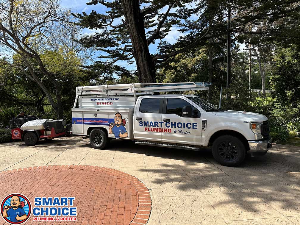 Smart Choice Plumbing truck in customer driveway.