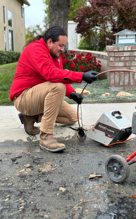 Plumber Outside with Video Snake